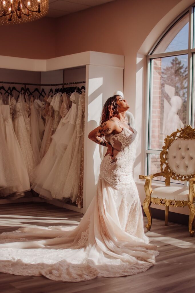a bride posing confidently by the window 