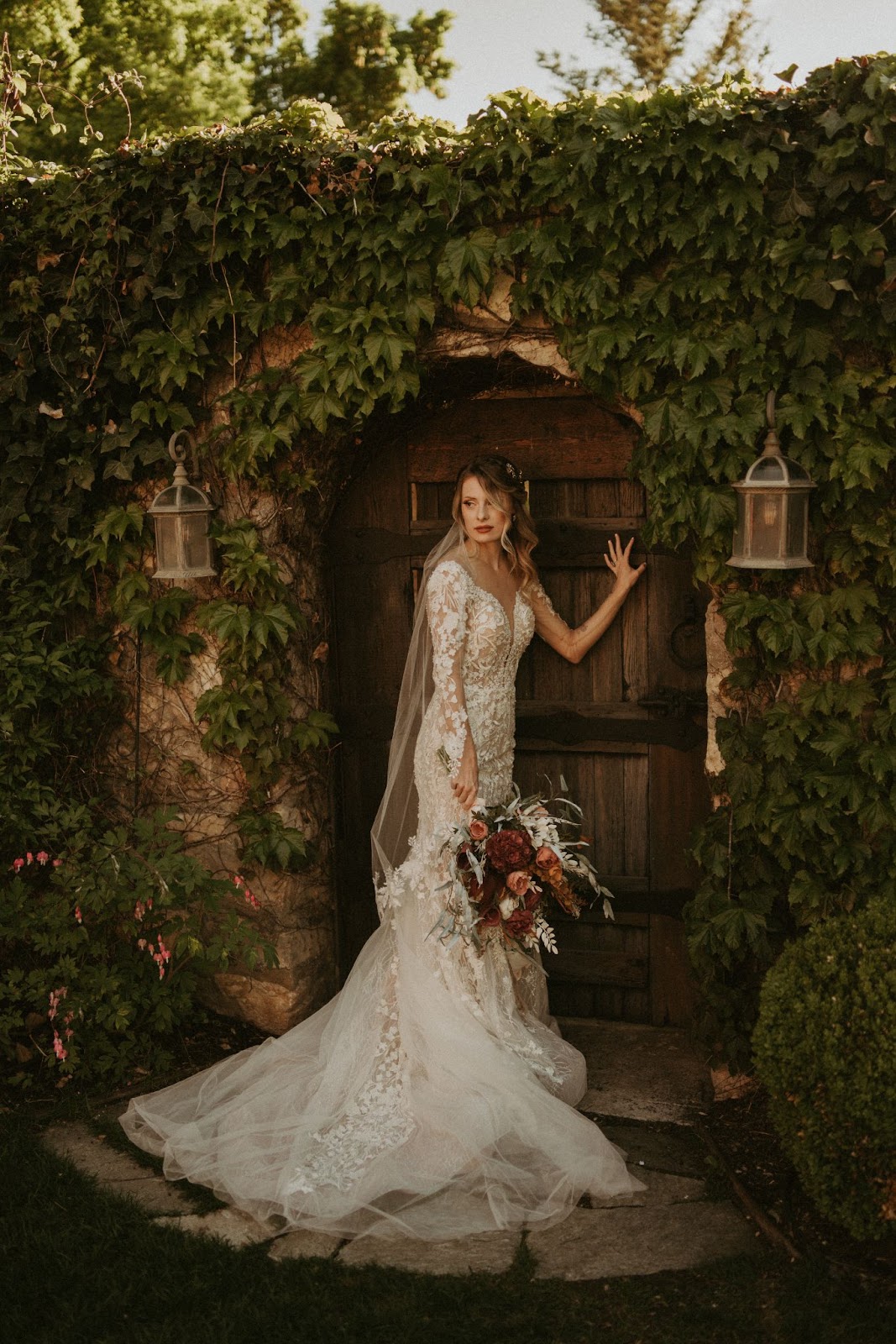 a woman in her body-hugging laced wedding dress