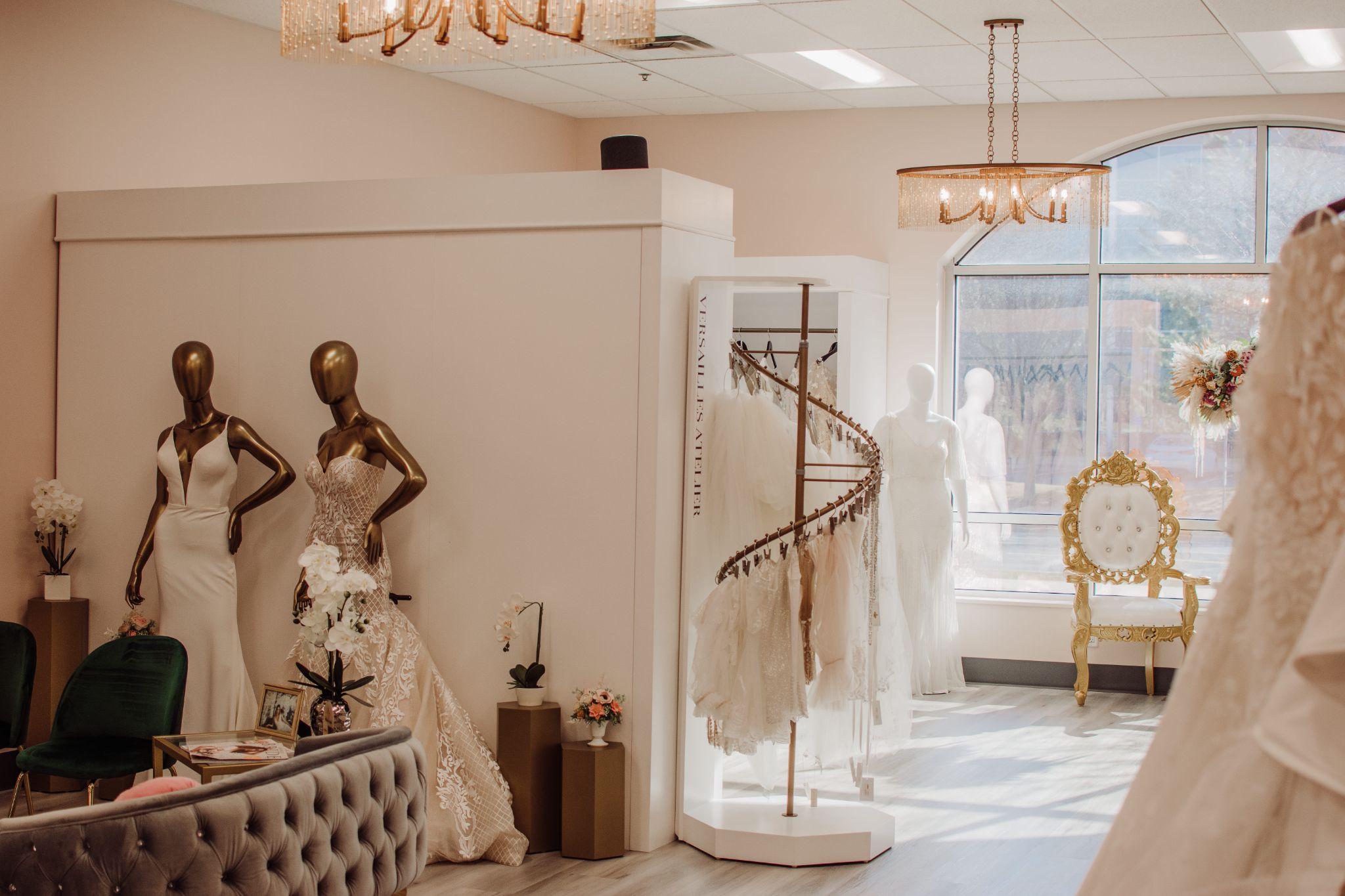 versailles atelier bridal shop interior with elegant gowns classy displays